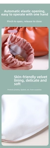 Detailed view of the self-closing PU leather pouch with soft velvet lining and metal spring