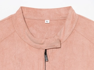Detail view of pink suede jacket with stand collar, metallic zipper, and smooth fabric texture