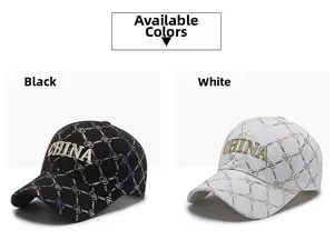 Detail view of black and white baseball caps with all-over print and CHINA embroidery