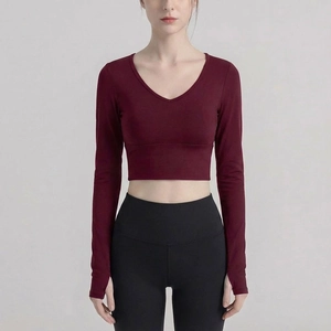 Slim fit long sleeve V-neck yoga crop top in burgundy with thumbhole design for women