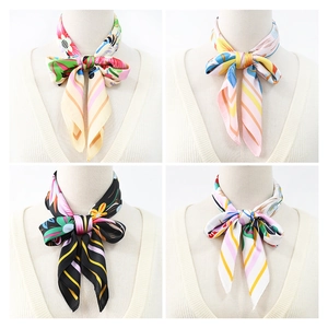 Satin floral silk scarves shown in four patterns with elegant bow knot styling