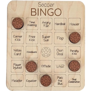 Close-up of wooden Soccer BINGO board with engraved football terms and round game pieces