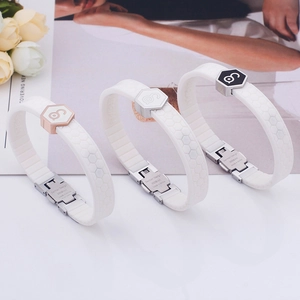 Titanium steel silicone bracelets in white with silver, rose gold, and black hexagon accents