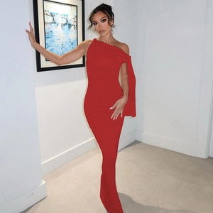 Detailed view of red one-shoulder evening dress with sleek shoulder strap and slim fit