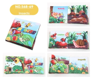 Détail d'un livre en tissu pour bébé sur les insectes avec motifs colorés de papillon et coccinelle