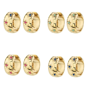 Golden chunky hoop earrings with star engravings and colorful micro-set zircons