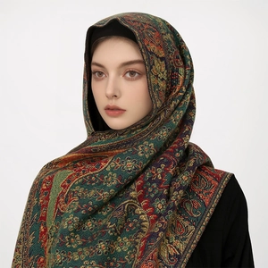 Detailed macro shot of thick woven multi-color scarf with floral paisley patterns