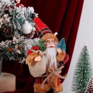 Detail of plush standing Santa Claus figure with plaid hat and festive miniature accessories