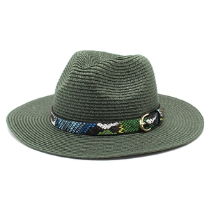 Detail of dark green woven straw fedora with colorful snakeskin band and gold buckle