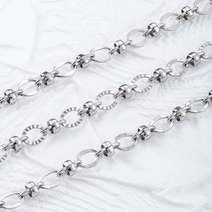 Polished silver stainless steel oval link chain with grooved beads for DIY jewelry making
