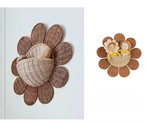 Detail of flower-shaped rattan wall basket for nursery storage and Nordic home decoration