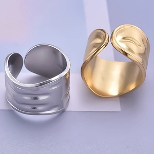 Irregular textured wide band rings in gold and silver finish with open adjustable design