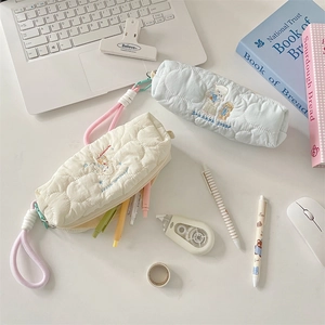 Quilted pencil cases with cute sheep embroidery and colorful woven zipper lanyards