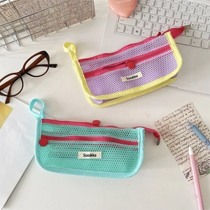 Mesh makeup organizer and pencil case with contrast piping and zipper detail