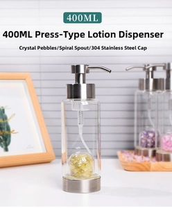 Detail of 400ml glass bottle with yellow crystals and 304 stainless steel pump