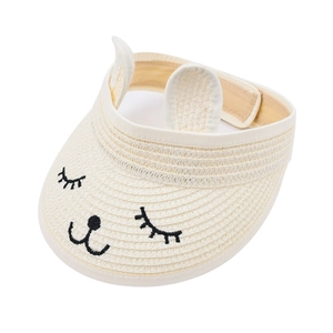 Detailed view of kids straw sun hat featuring cat embroidery and cute 3D cat ears