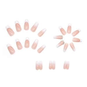 French gradient long coffin press-on nails with rhinestones in nude and white tones