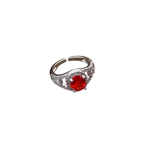 Adjustable silver ring with oval red gemstone and sparkling floral zircon accents