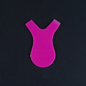 Pink Y-shape eyelash lifting tool with comb teeth and non-slip handle on black background