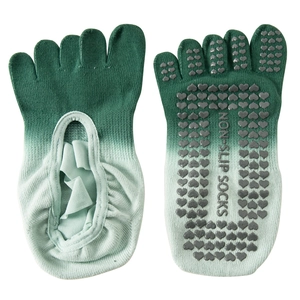 Gradient green non-slip five-toe yoga socks with heart-shaped silicone grips on the bottom