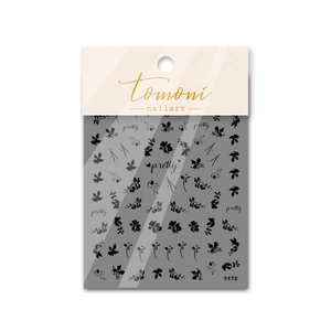 Close-up of black floral and leaf nail art stickers with pretty text patterns