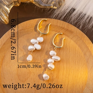 Detail view of Baroque pearl tassel earrings showing size specs 6.8cm long and 7.4g weight