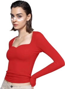 Detail of red long sleeve cropped top with a square neckline on a model with white background