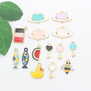 DIY colorful alloy enamel pendants featuring bee, duck, and fruit designs for jewelry making