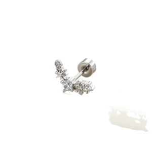 Star-shaped silver stud earring with micro-paved zircons on a white background