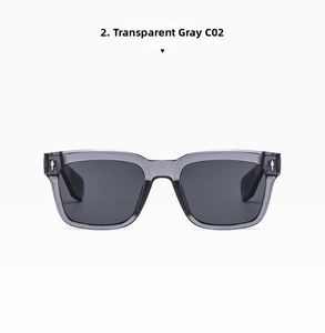 Detail of transparent grey square frame sunglasses with signature silver arrow rivets