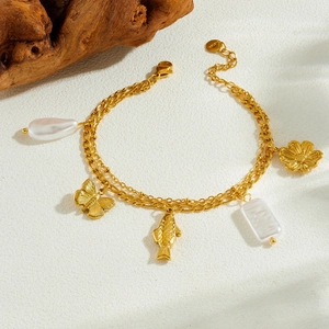 Double-layered gold-plated chain bracelet with pearl, butterfly, and fish charms for women
