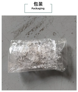 Detailed view of clear acrylic snowflake ornaments in professional OPP bag packaging