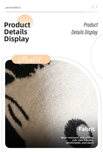 Detailed knit texture of a thick winter shawl featuring a cute cartoon cat pattern