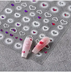 Detail of M-493 nail art stickers featuring 3D frosted hearts and purple metallic butterflies