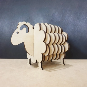 Detail of wooden sheep coaster set showing laser-cut 3D wood texture and layered structure