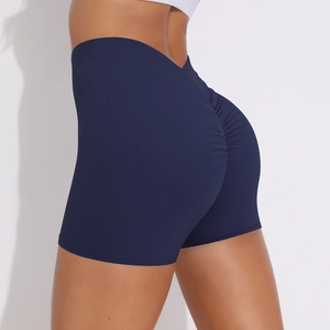 Close-up of navy blue high-waisted yoga shorts with scrunch butt lifting details