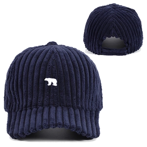 Navy blue corduroy baseball cap with white polar bear embroidery and adjustable strap