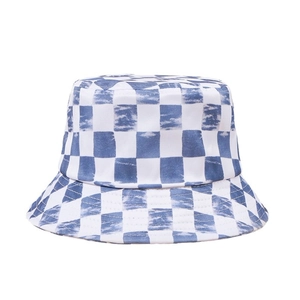 Blue and white checkerboard bucket hat with abstract cloud pattern for outdoor sun protection