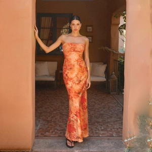 Elegant strapless orange floral maxi dress with slimming fit for vacation style