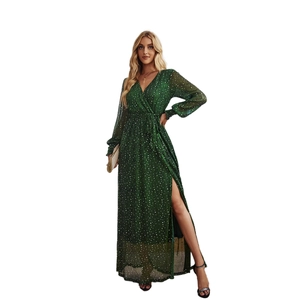 Elegant dark green long-sleeve maxi dress with white polka dots and high side slit design