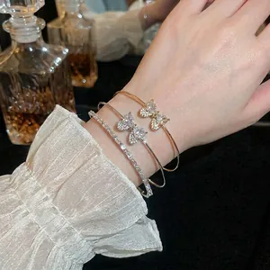 Elegant bow and heart zircon double-row open bangle set in gold and silver finish