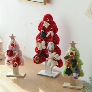 Handmade knitted wool felt Christmas trees with deer and star decor on wooden base