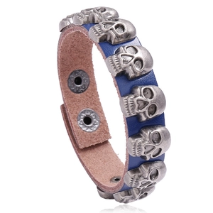 Men's punk leather skull bracelet in royal blue finish with vintage snap buckle