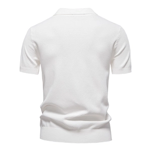 Detailed back view of white knit polo shirt featuring premium waffle texture and ribbed hems