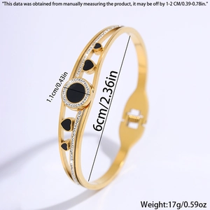 Detail view of gold titanium steel heart bracelet with 6cm diameter and 1.1cm width