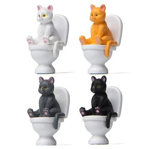 Set of four creative cat figurines sitting on toilets for miniature garden landscape decor