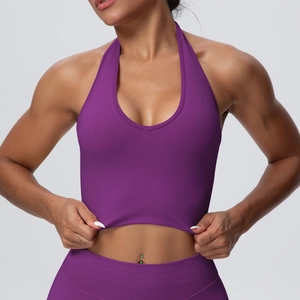 Detail of purple seamless knitted halter sports bra and high waist yoga leggings set