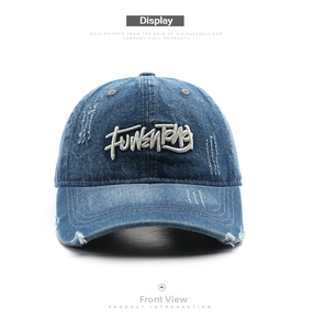 Detailed embroidery of FUNENTING letters on vintage distressed navy denim baseball cap