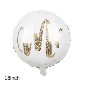 Detailed view of an 18-inch white round foil balloon with shiny gold Mr text print
