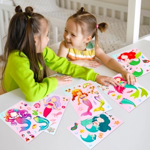 Kids playing with mermaid dress-up stickers at a clean white table for DIY fun